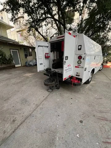 Magnet Plumbing service vehicle on-site for Sewer Line Repair in Parkland